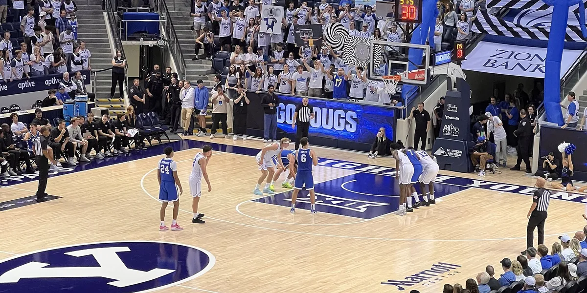 BYU basketball player action during a Blue and White game at the Marriott Center, used as real editorial imagery for BYU Sport Nuts.