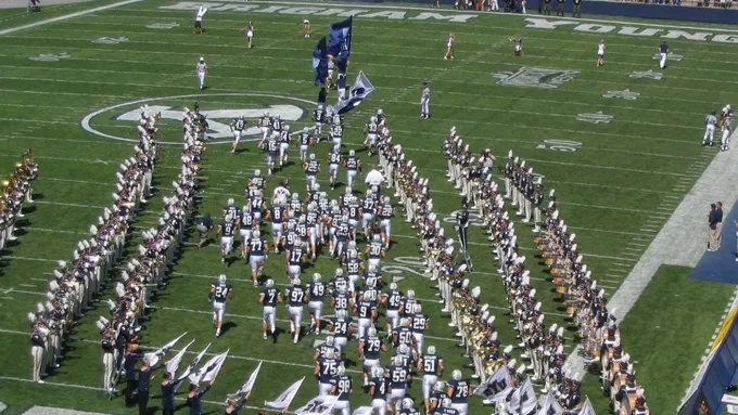 BYU football players entering LaVell Edwards Stadium, used as real editorial imagery for BYU Sport Nuts.